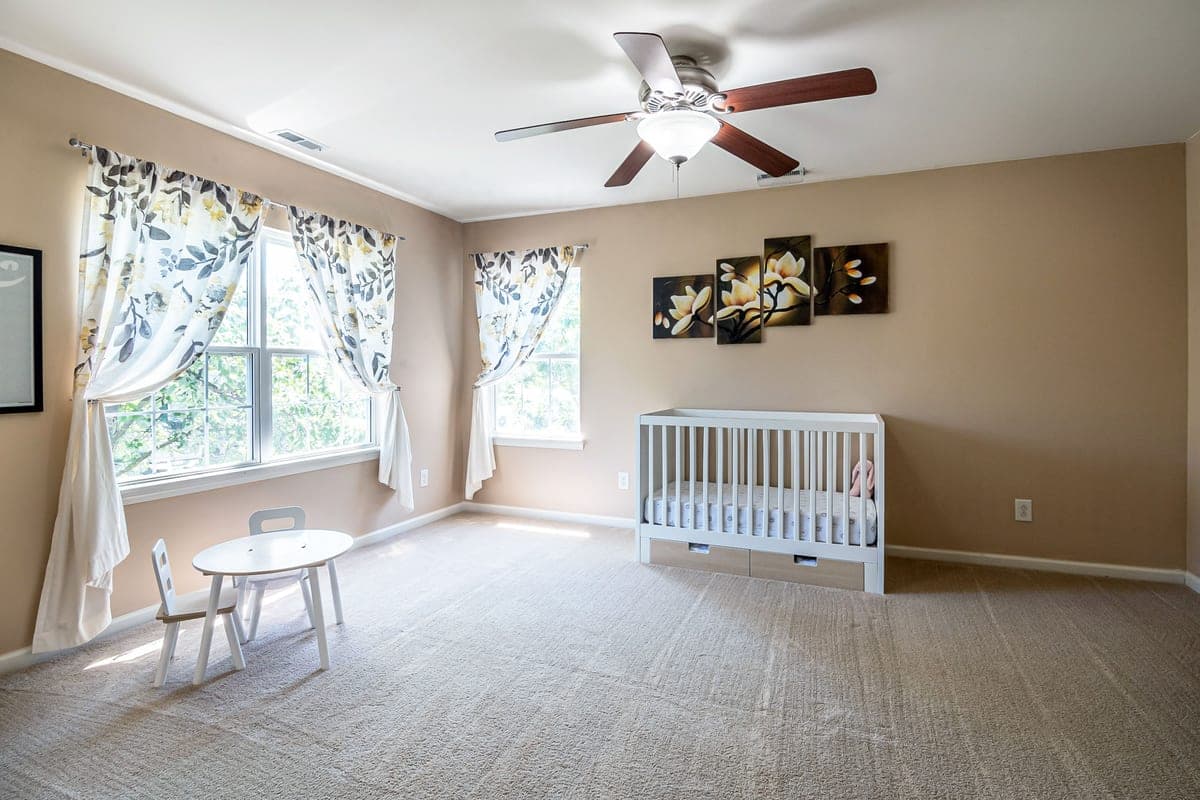 A calm, uncluttered children's bedroom