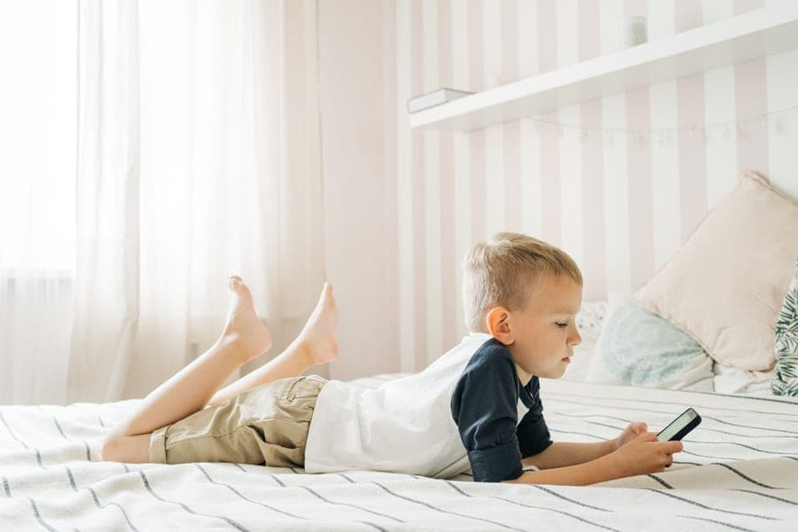 A safety rail fitted to the side of a child's bed