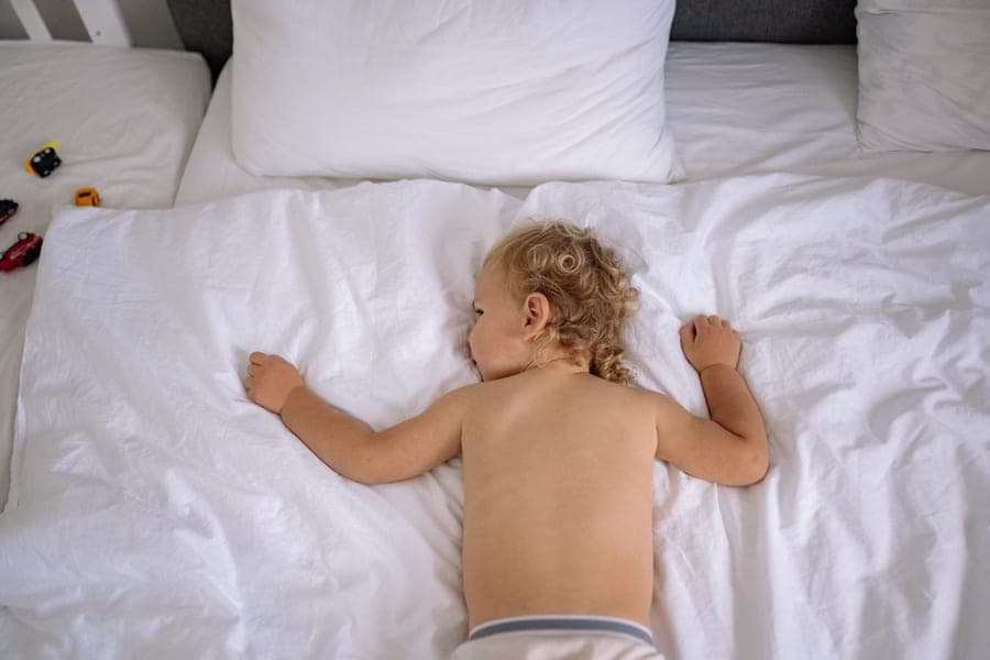 A low wooden toddler bed frame